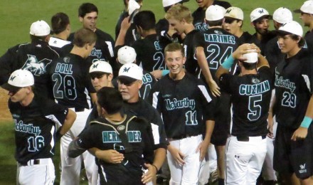 Archbishop McCarthy - celebration Mavericks players and coaches celebrate following their 4-2 comeback victory to send them back to the state tournament.